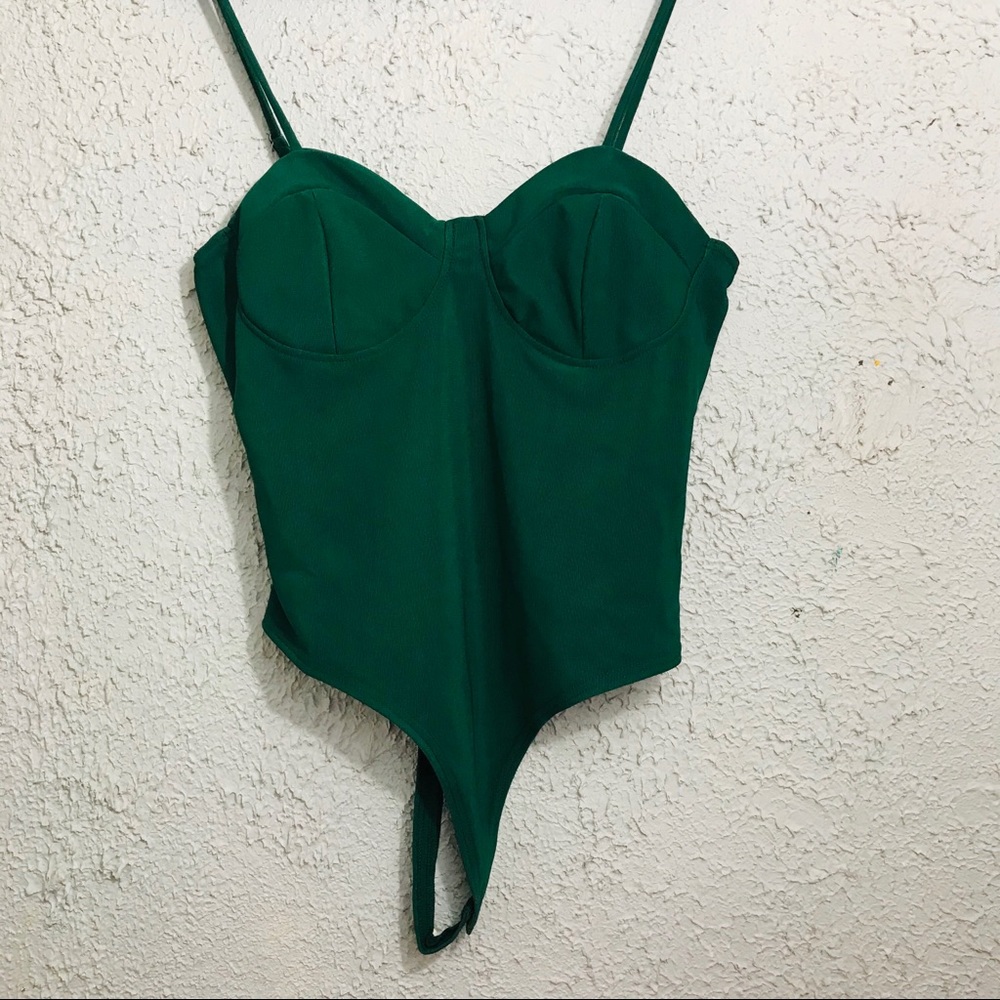 Green bodysuit from vixen icon